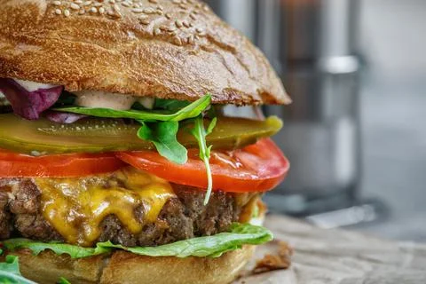 Beef Egg and Bacon Burger Served in Restaurant. American fastfood. Tasty Gour Stock Photos
