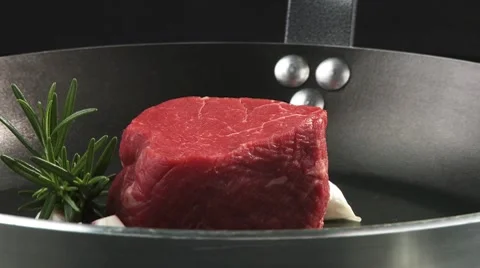 Beef fillet in a frying pan Stock Footage 8572746