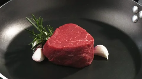 Beef fillet in a frying pan Stock Footage 8572747