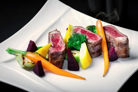 Beef fillet with grilled beetroot and fennel with creamy mushroom sauce-2 Stock Photos