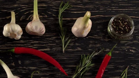 Beef fillet on a pan with pepper, rosemary and garlic. Video stock 74211892
