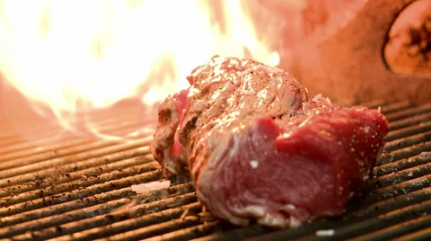 Beef flaming on grill Stock Footage 32013991
