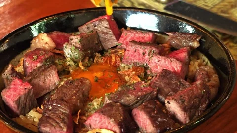 Beef fried rice topping with beef and scoop pickled egg yolks. Stock Footage 310947028