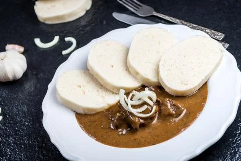 Beef goulash with dumplings Stock Photos