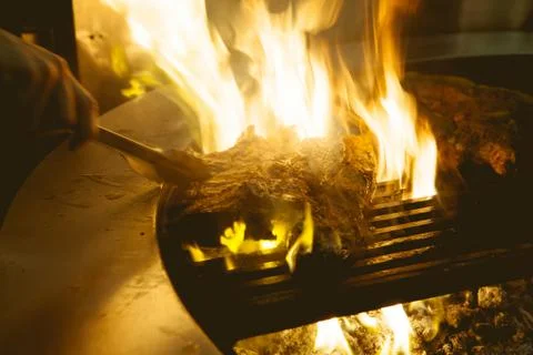 Beef grill on stove in five star hotel restaurant for luxury dinner party, Bl Stock Photos