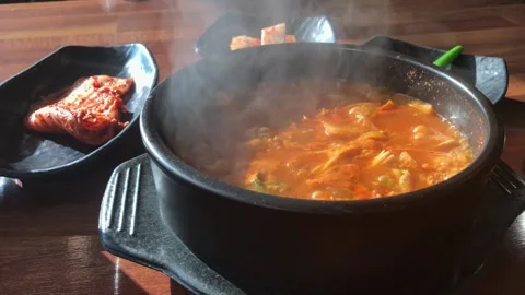 Beef intestine stew in an earthenware pot Stock Footage 266675559