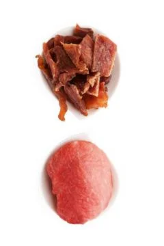Beef jerky, isolated on white. Stock Photos