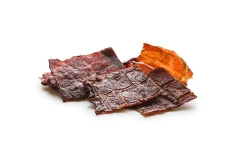 Beef jerky isolated on a white studio background Фото