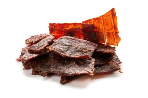 Beef jerky isolated on a white studio background Stock Photos