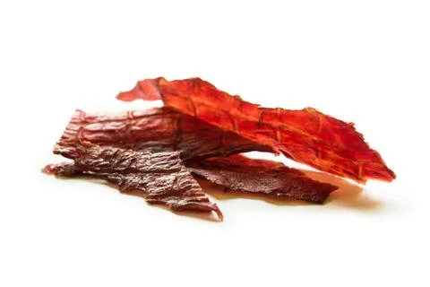 Beef jerky isolated on a white studio background Stock Photos