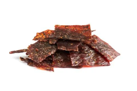 Beef jerky isolated on a white studio background Stock Photos