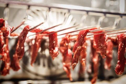 Beef jerky in process of preparing Stock Photos