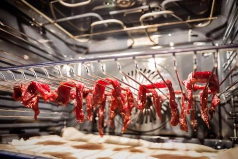 Beef jerky in process of preparing Stock Photos