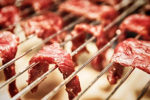 Beef jerky in process of preparing Stock Photos