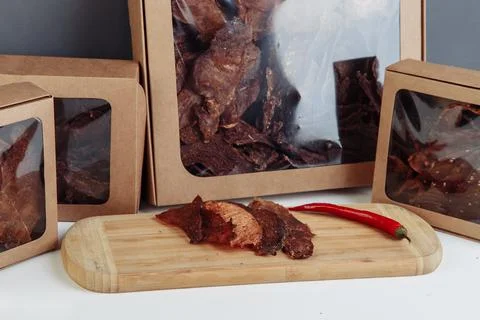 Beef jerky snack high in protein, lean meat. smoked, dried food. Stock Photos
