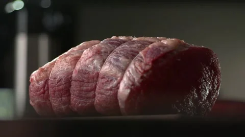BEEF JOINT TIED UP WITH STRING. Slow motion. Stock Footage 41204298