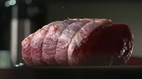 BEEF JOINT TIED UP WITH STRING. Slow motion. Stock Footage 41204593