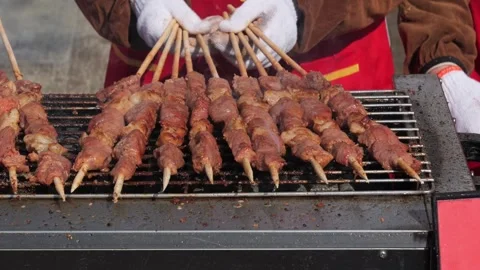 Beef kebab on a fire hot barbecue grill, close-up,4k,Chinese street cuisine Видео 264597607