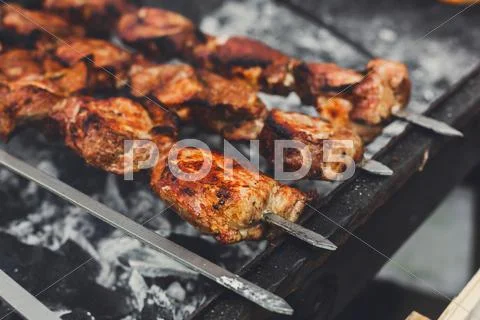 Beef kebab. Fresh meat at grill, bbq Stock Photos