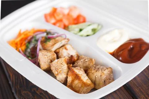 Beef kebab in plastic packaging. Takeaway food Stock Photos
