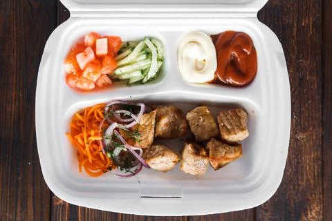 Beef kebab in plastic packaging. Takeaway food Stock Photos