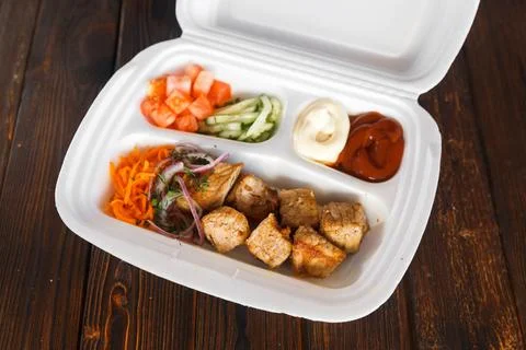 Beef kebab in plastic packaging. Takeaway food Stock Photos
