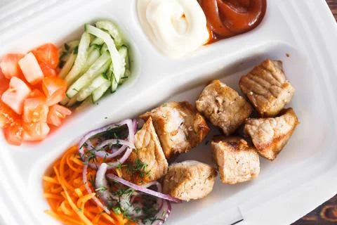 Beef kebab in plastic packaging. Takeaway food Stock Photos