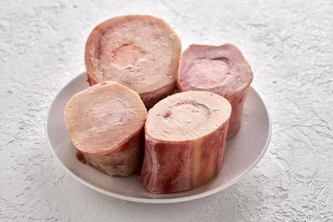 Beef marrow bones - ingredient to prepare broth or soup Stock Photos