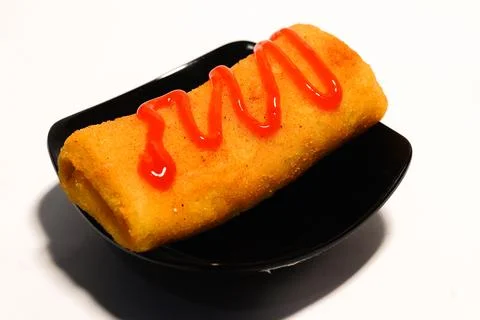 Beef mayo risoles with tomato sauce topping isolated on white Stock Photos