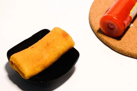 Beef mayo risoles with tomato sauce topping isolated on white Stock Photos