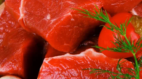 Beef meat fillet in a ceramic dish with garlic Stock Footage 25005587