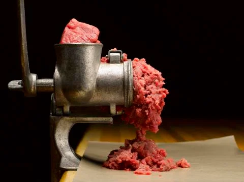 Beef in a Meat Grinder Stock Photos