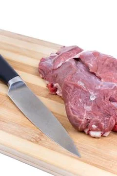 Beef meat with kitchen knife on the cutting board Foto stock