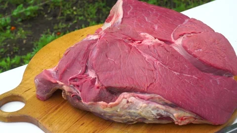 Beef meat is a large piece on a cutting board Stock Footage 198925203