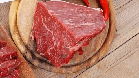 Beef meat steak and chunk on wood Vídeos de archivo 88889042