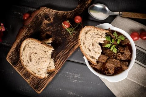Beef meat stew in ceramic pot. Stock Photos