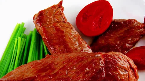 Beef meat on white plate Vídeos de archivo 25097227