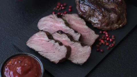 Beef mignon steak, rare, meat grilled with salt and spices. Beef steak Video stock 335839256
