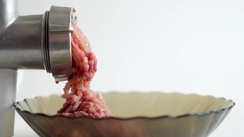 Beef mince in a mincing machine, close up. Stock Footage 254081916