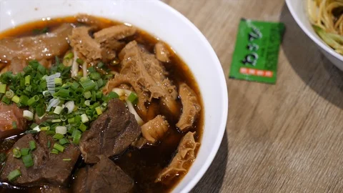 Beef noodle soup broll plating shot Hong Kong Stock Footage 102346711