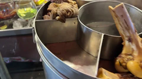 Beef organs and bone soup Asian street food in Cambodia Stock Footage 336597281