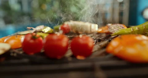 Beef patty falling on barbecue grill Stock Footage 311829006