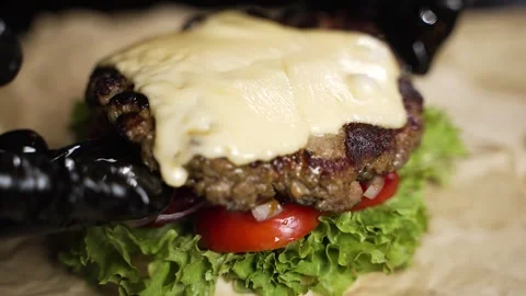 Beef patty with melted cheese Stock Footage 297004227