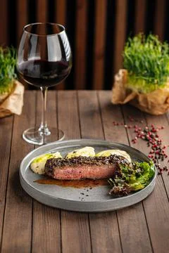 Beef pepper steak with celery puree dish Stock Photos