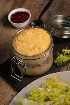 Beef pie recipe with red beet sauce cooked with chili spices and salad Stock Photos