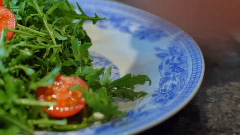 Beef on a plate with arugula Stock Footage 121086223