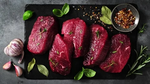 Beef. Raw beef tenderloin meat, beef steaks with ingredients for cooking Stock Footage 279512567