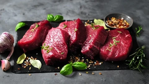 Beef. Raw beef tenderloin meat, beef steaks with ingredients for cooking Stock Footage 279512574