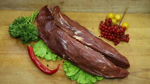 Beef, raw pieces of decor from the chef Stock Footage 130002786