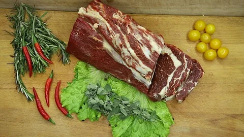 Beef, raw pieces of decor from the chef Stock Footage 130002790